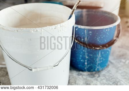 The Concept Of Repair Of The House And Premises. Buckets Of Paint And Lime For Whitewashing And Pain