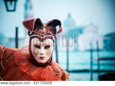 Venice, Italy - 02 14 2012: A Traditional Joker Mask At The Famous Venetian Carnival Where People Sh