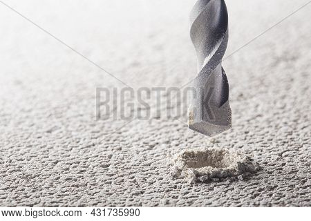 Drill Bit Make Holes In Concrete Wall With Industrial Drill. Building Work Industry.