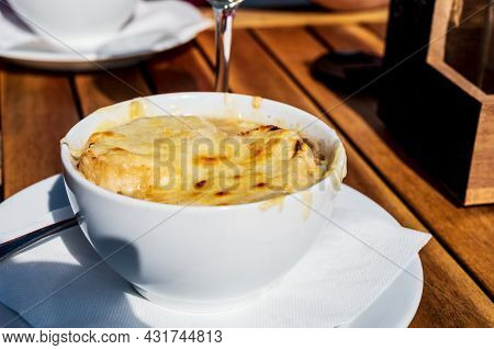 French Caramelized Onion Soup With Croutons And Gruyere Cheesse From Oven