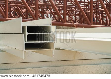 I-beam Steel, I-beam Steel Painted White Lay Piles On Concrete, Raw Materials Used In Building Const