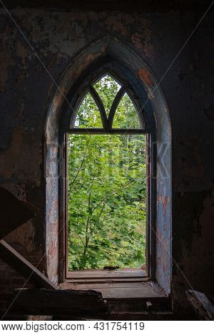 Ogival Window In Old Ruined Abandoned Historical Mansion In Gothic Style