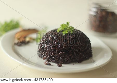 Black Rice Pulao. A One Pot Rice Preparation With Black Rice, Ghee And Spices