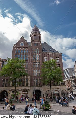 Amsterdam, Netherlands - August 14, 2021: Brown Stone Twenty Seven Hotel On Corner Of Dam And Rokin.
