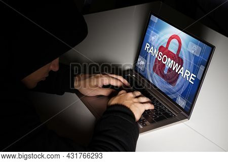 Ransomware Virus. Ransom Extortion Attack. Hacked Encrypted Laptop