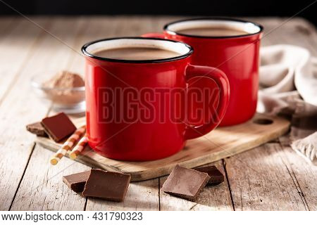 Traditional Mexican Chocolate Atole Drink On Wooden Table