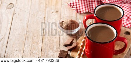 Traditional Mexican Chocolate Atole Drink On Wooden Table. Panorama View