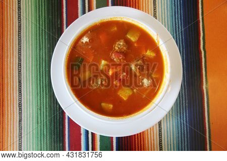 Sopa de albondigas, Mexican meatball soup with potato, carrots. Mexican vegetable soup with meatballs Albondigas