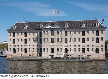 Amsterdam, Netherlands - August 15, 2021: Beige Stone Square Massive Maritime Or Scheepvaart Museum 