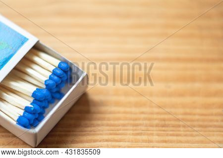 Wooden Safety Matchsticks Stacked In Cardboard Matchbox On Wooden Background.box Of Matches.wooden T