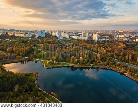 Aerial View Of A Lake In A Park With Autumn Trees. Kishinev, Moldova. Epic Aerial Flight Over Water.