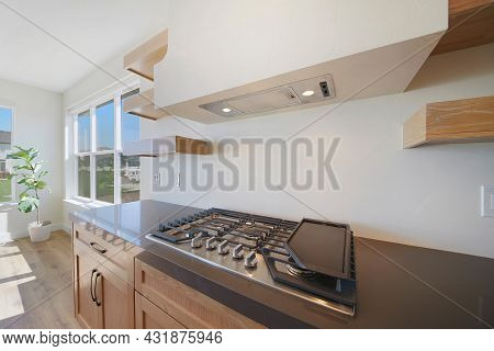Well Lit Modern Contemporary Kitchen Interior With Wood