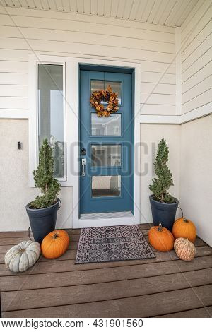 Blue Green Front Door With Frosted Glass Panels And Sidelight