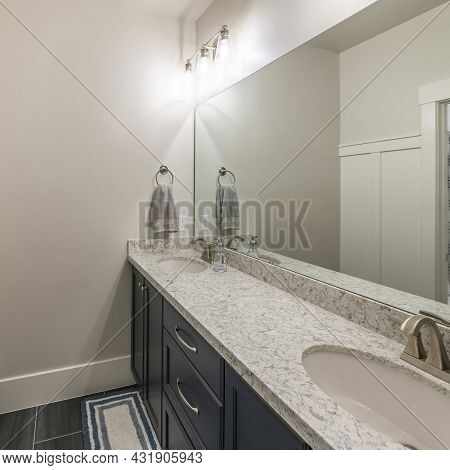 Square Frame Bathroom Interior With Double Vanity Sink And Separate Toilet