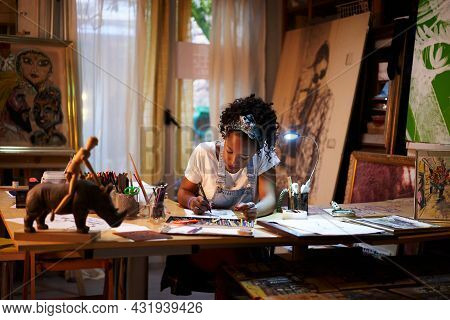 Young African-american Artist At Work In The Studio. Creative Person Making Art.