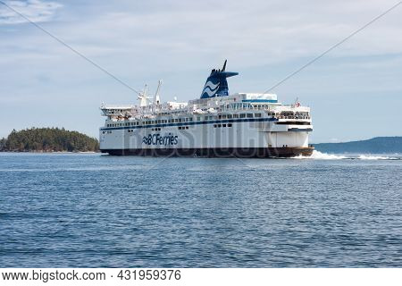 Victoria, Vancouver Island, British Columbia, Canada - August 18, 2021: Bc Ferries Boat Leaving The 
