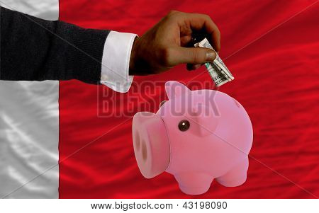 Dollar Into Piggy Rich Bank And  National Flag Of Bahrain