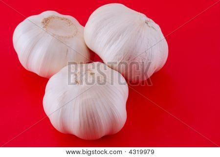 Garlics On Red