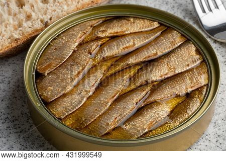 Canned smoked European sprat in oil for lunch close up