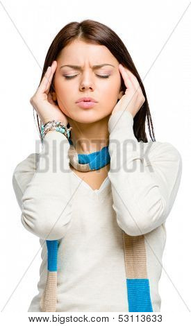Teen with eyes closed puts hands on head because of headache or unsolvable problems, isolated on white