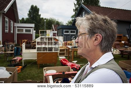 Senior Woman At Auction