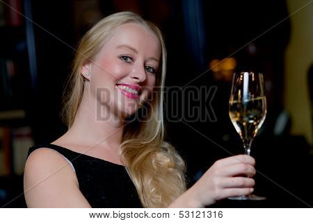 Beautiful Happy Woman Celebrating With Champagne
