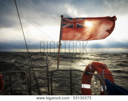 Sailship with british flag on sea