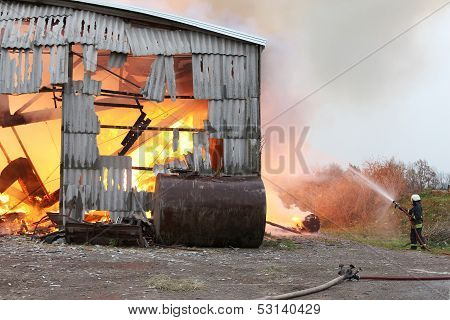 Burning farm with 1000 tons hay in Lithuania.