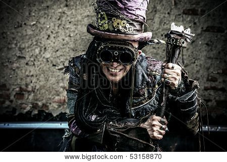 Portrait of a steampunk man in the ruins.