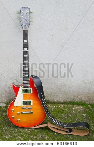 Guitar And Wall