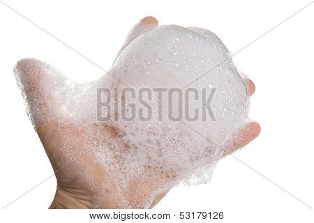 Soapy foam on man's hand