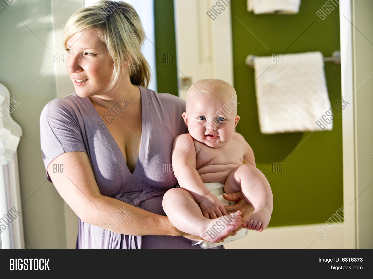 Mother Carrying Cute Image & Photo (Free Trial) Bigstock