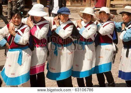 Chinese Naxi Old Woman Performing A Dance.