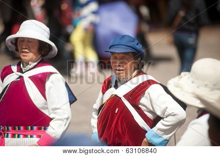 Chinese Naxi Old Woman Performing A Dance.