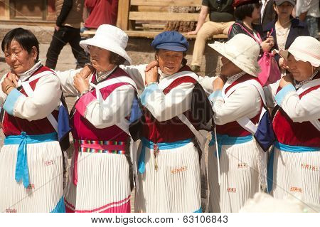 Chinese Naxi Old Woman Performing A Dance.