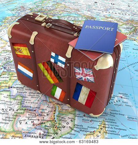 Old Suitcase With Passports And Striples Flags On World Map Background