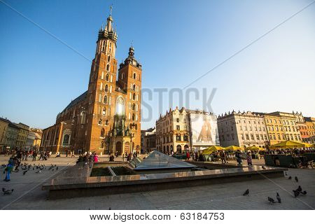 KRAKOW, POLAND - FEB 26, 2014: View of the Main Square. It dates to the 13th century, and at roughly 40,000 m it is the largest medieval town square in Europe.