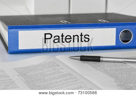 A blue folder with the label Patents