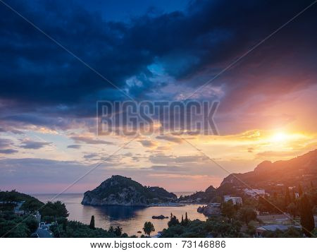 Paleokastritsa at sunset in COrfu Greece