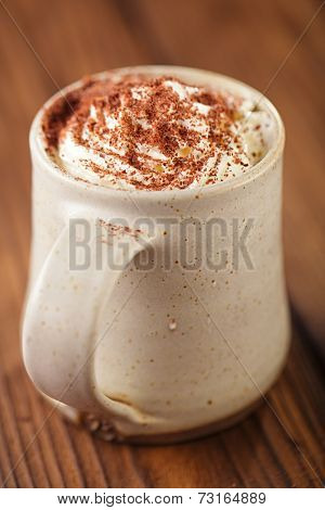 hot chocolat vintage mug, topping with cream and grated chocolate, shallow dof