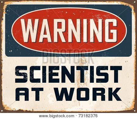 Vintage Metal Sign - Warning Genius At Work - Vector EPS10. Grunge effects can be easily removed for a cleaner look.