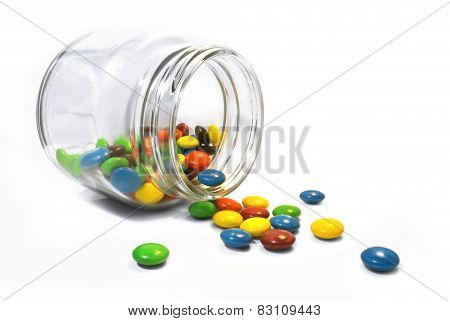 color candy in clear glass pot bottle
