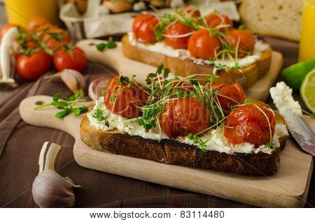 Roasted Cherry Tomato Sauce And Ricotta On Toast