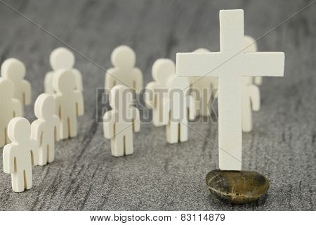 Wooden figures and a wooden cross