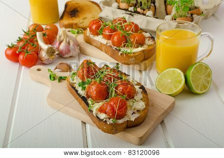 Roasted Cherry Tomato Sauce And Ricotta On Toast