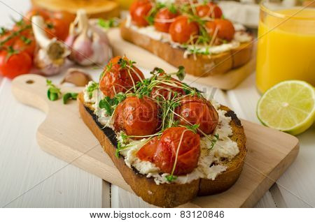Roasted Cherry Tomato Sauce And Ricotta On Toast
