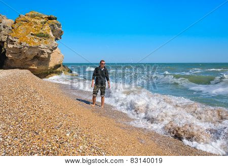 Young Man On The Beach