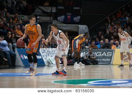 VALENCIA, SPAIN - FEBRUARY 15: Nedovic 8, Carroll during Spanish League match between Valencia Basket Club and Real Madrid at Fonteta Stadium on February 15, 2015 in Valencia, Spain