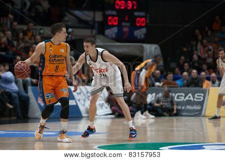 VALENCIA, SPAIN - FEBRUARY 15: Nedovic 8, Carroll during Spanish League match between Valencia Basket Club and Real Madrid at Fonteta Stadium on February 15, 2015 in Valencia, Spain