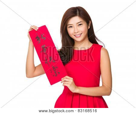 Woman with Fai Chun for Chinese new year, phrase meaning is happy new year 
